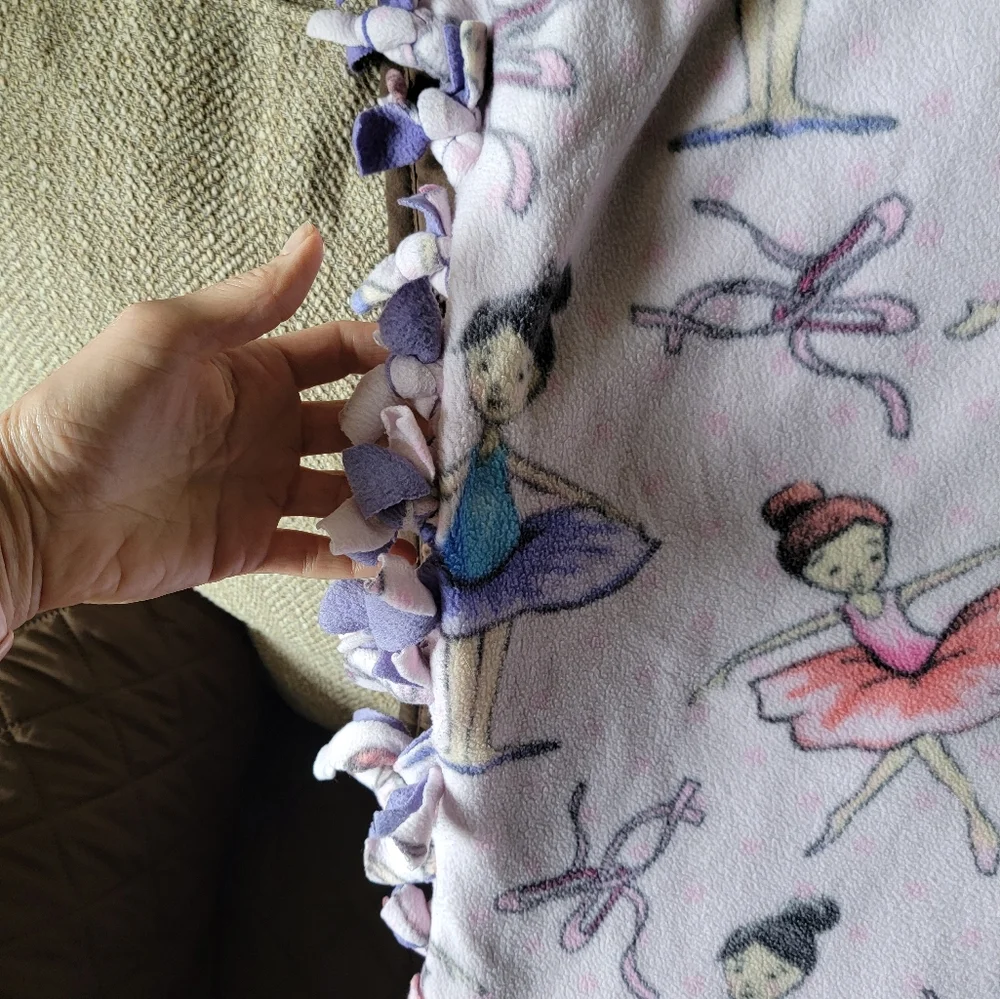 Ballerina acid-wash look fleece blanket. Hand tied.